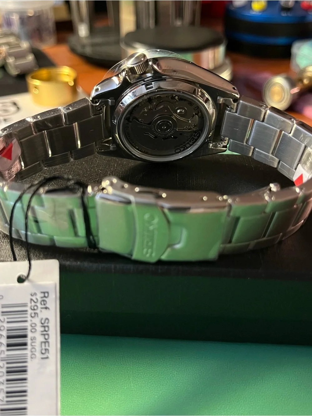 Seiko : Retro GT dial. Silver Dial Watch with Orange Stripe Accent SRPE55